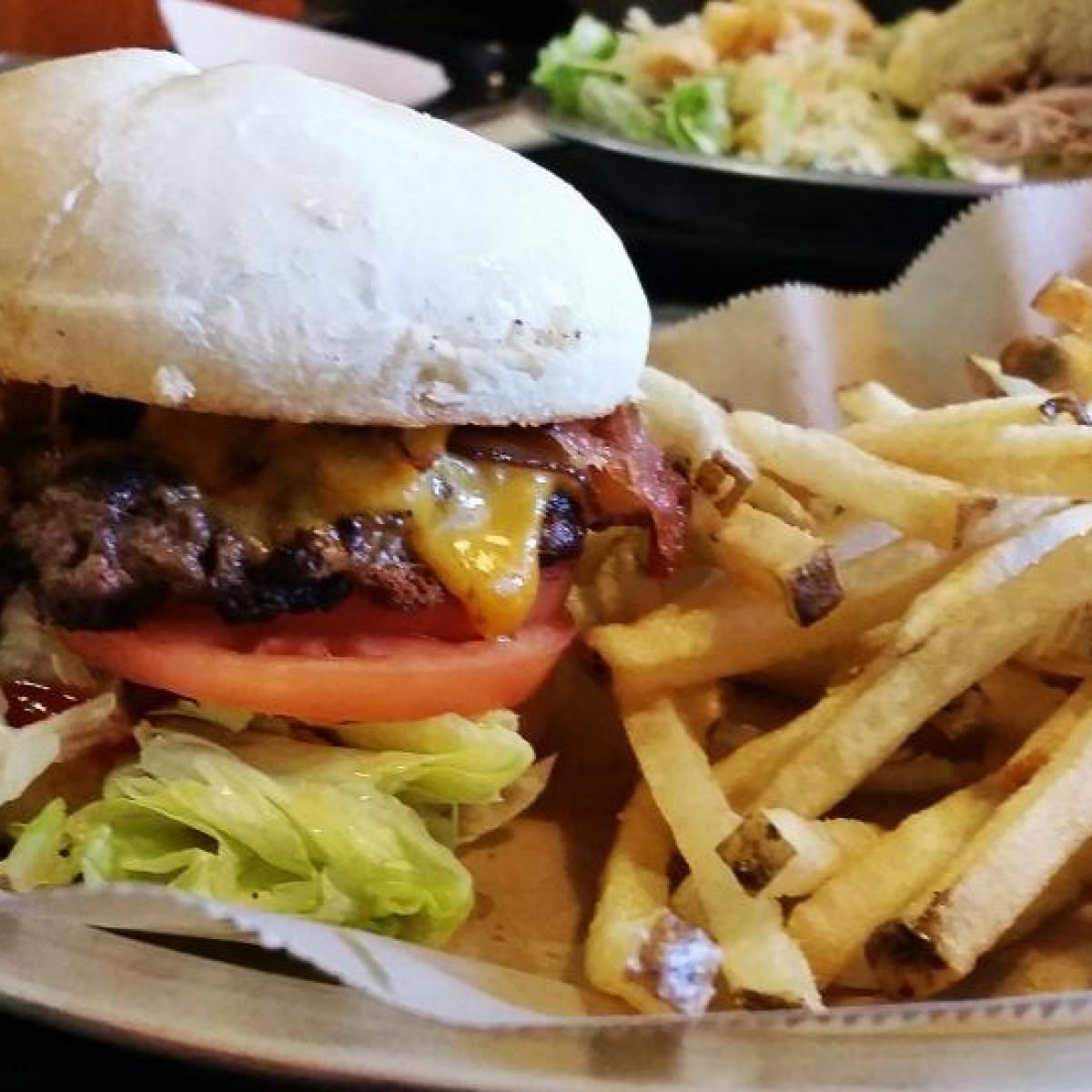 a burger and fries on a plate