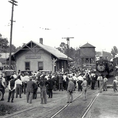 a group of people at a train station