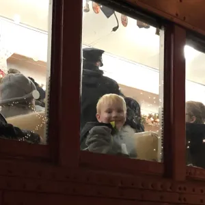 a group of people inside a train